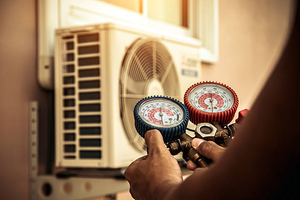 Professional Air Conditioning Service technician working in Erwinna, PA